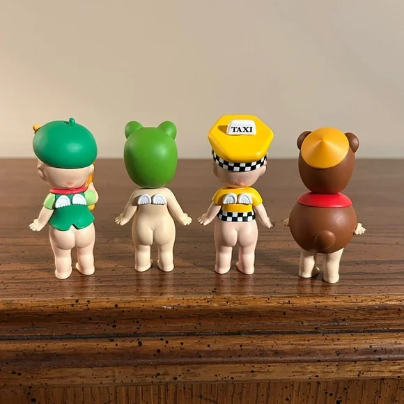 Sonny Angel Lot of 4 Sonny Town Musician, NYC Yellow Taxi Cab, Frog, Raccoon Dog - Picture 2 of 4